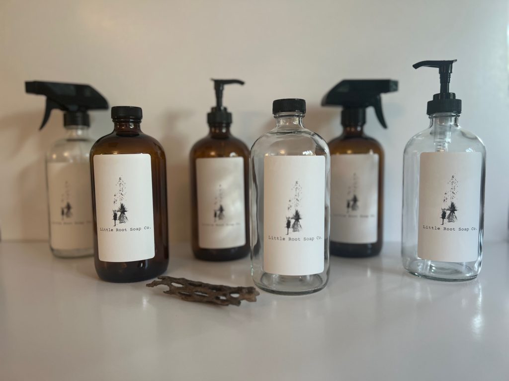 Amber and clear glass refill bottles with pump and spray tops
